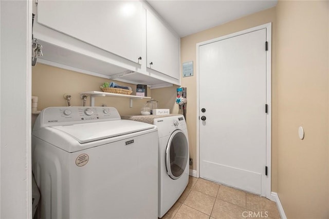3112 N Hearthside St, Orange, CA 92865 - laundry room featuring washer and dryer, cabinet space, and light tile patterned flooring