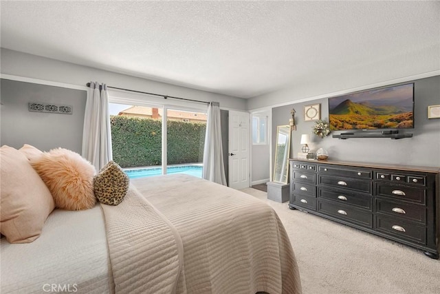 3112 N Hearthside St, Orange, CA 92865 - bedroom featuring access to outside, light carpet, and a textured ceiling