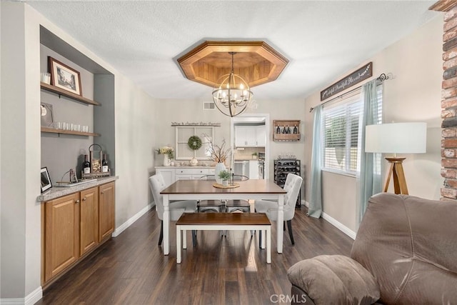3112 N Hearthside St, Orange, CA 92865 - dining space featuring a chandelier and dark wood-style floors