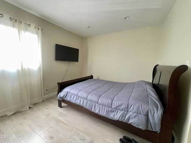 10149 Commerce Ave Unit 2, Tujunga, CA 91042 - bedroom featuring wood finished floors and baseboards