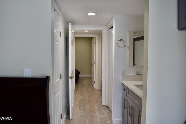 10149 Commerce Ave Unit 2, Tujunga, CA 91042 - hall with light wood-type flooring and recessed lighting