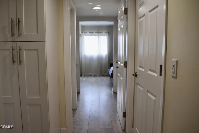 10149 Commerce Ave Unit 2, Tujunga, CA 91042 - corridor with light wood-type flooring and baseboards