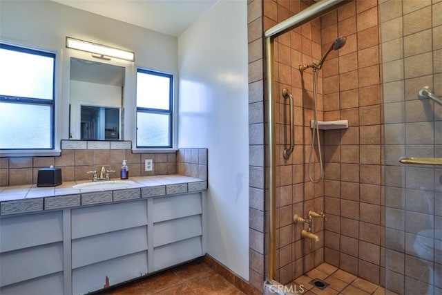 1853 E Renshaw St, Covina, CA 91724 - bathroom with plenty of natural light, a shower stall, vanity, and tile patterned flooring