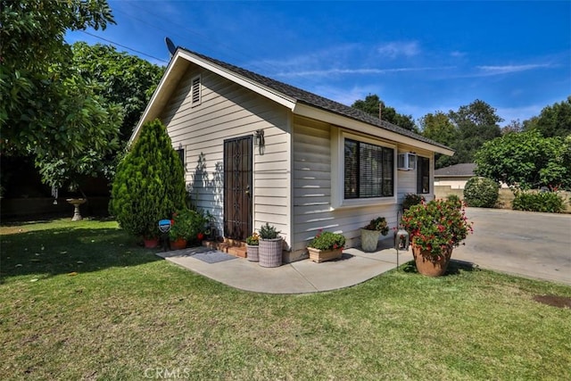 1853 E Renshaw St, Covina, CA 91724 - view of side of property with a lawn and an outdoor structure