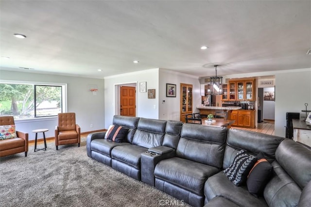 1853 E Renshaw St, Covina, CA 91724 - living room with recessed lighting, crown molding, and light carpet