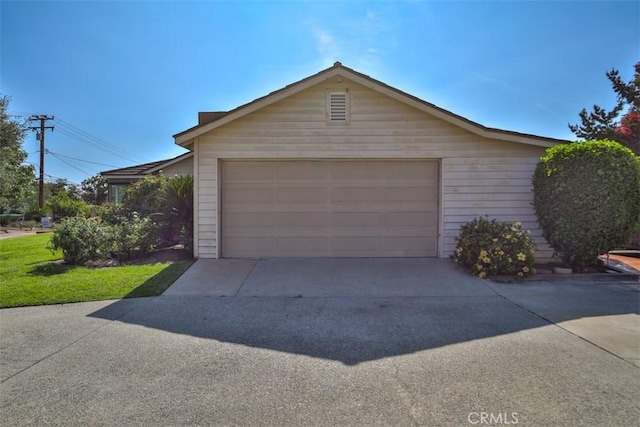 1853 E Renshaw St, Covina, CA 91724 - garage featuring concrete driveway