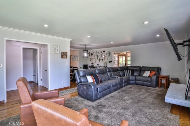 1853 E Renshaw St, Covina, CA 91724 - living room with ornamental molding, wood finished floors, and recessed lighting