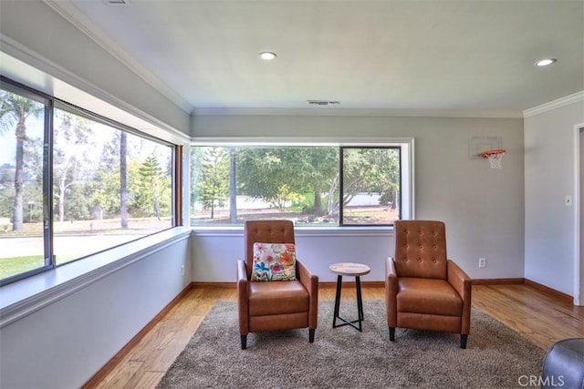 1853 E Renshaw St, Covina, CA 91724 - sitting room with ornamental molding, light wood-type flooring, and recessed lighting