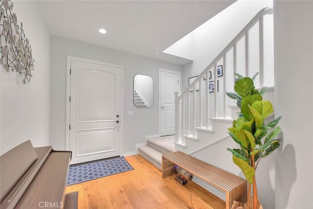 25 Sedgewick, Irvine, CA 92620 - foyer with stairway, wood finished floors, and recessed lighting