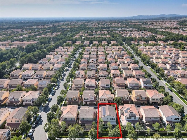 25 Sedgewick, Irvine, CA 92620 - aerial view of residential area with property boundaries highlighted and a mountain backdrop