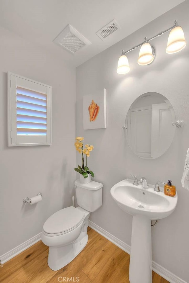 25 Sedgewick, Irvine, CA 92620 - half bathroom featuring wood finished floors