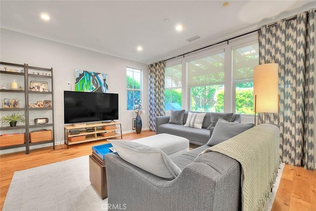 25 Sedgewick, Irvine, CA 92620 - living room featuring wood finished floors, recessed lighting, and ornamental molding