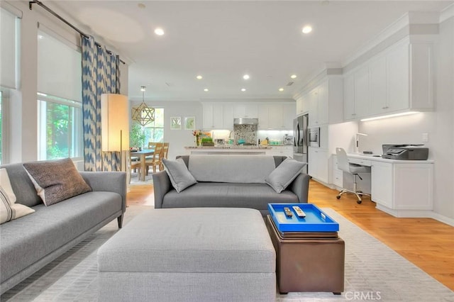 25 Sedgewick, Irvine, CA 92620 - living area featuring light wood finished floors, recessed lighting, and an office area