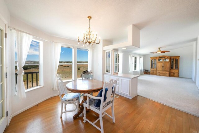 36748 Parrot Mountain Rd, Ranchita, CA 92066 - dining space featuring a chandelier, healthy amount of natural light, and light wood finished floors