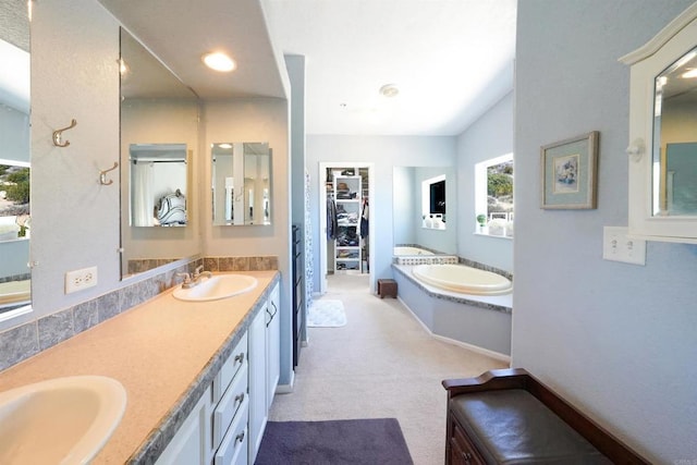 36748 Parrot Mountain Rd, Ranchita, CA 92066 - full bathroom featuring double vanity, a garden tub, a spacious closet, and recessed lighting