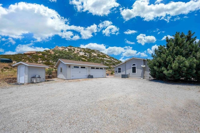 36748 Parrot Mountain Rd, Ranchita, CA 92066 - view of front of house with an outbuilding, a detached garage, and a mountain view