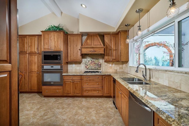 5073 Mycenae Way, Oceanside, CA 92056 - kitchen featuring stainless steel appliances, brown cabinetry, premium range hood, and light stone countertops