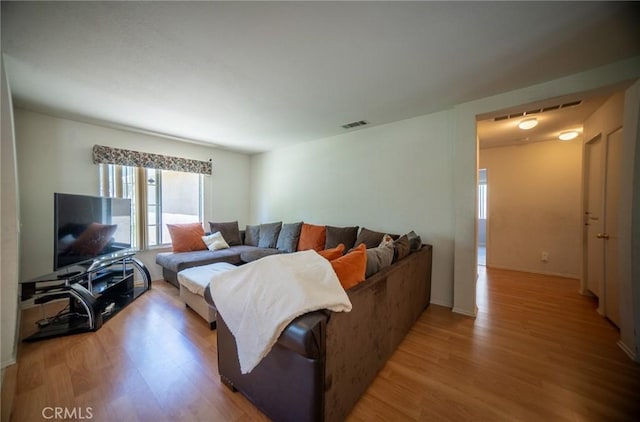3309 Kaylyn St, Lancaster, CA 93535 - living room featuring wood finished floors