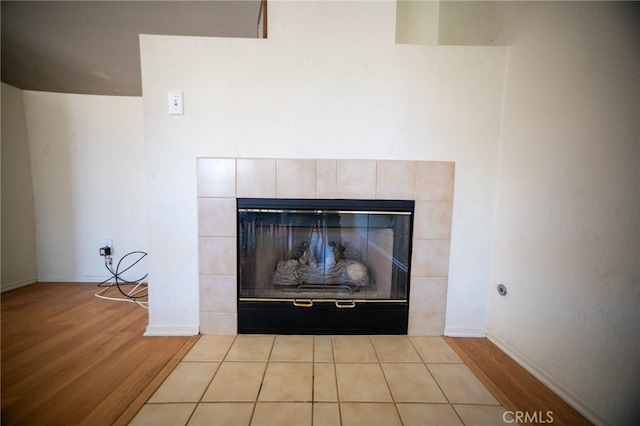 3309 Kaylyn St, Lancaster, CA 93535 - detailed view of a tiled fireplace and wood finished floors