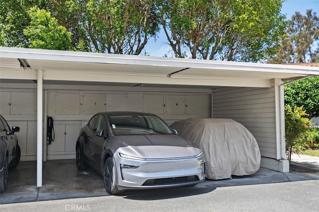 856 Ronda Mendoza Unit P, Laguna Woods, CA 92637 - garage featuring covered parking