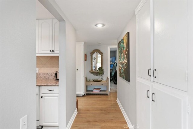 856 Ronda Mendoza Unit P, Laguna Woods, CA 92637 - corridor with light wood-style flooring and baseboards