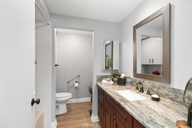 856 Ronda Mendoza Unit P, Laguna Woods, CA 92637 - bathroom featuring vanity, wood finished floors, and bathing tub / shower combination