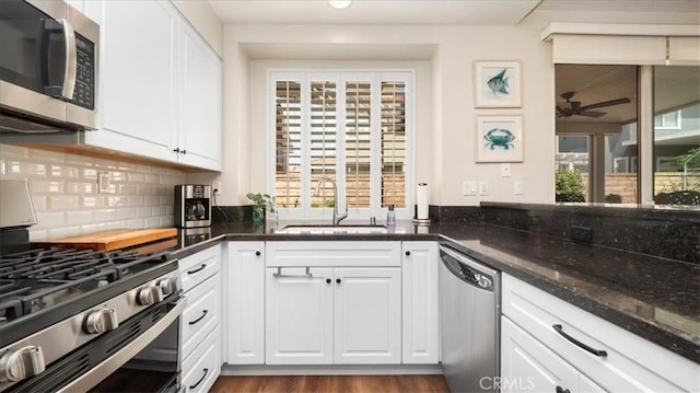 7192 Carano Pl, Rancho Cucamonga, CA 91701 - kitchen featuring stainless steel appliances, backsplash, and white cabinets
