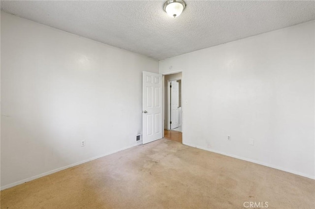 25286 N Rd, Twin Peaks, CA 92391 - spare room featuring light colored carpet and a textured ceiling