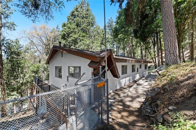 25286 N Rd, Twin Peaks, CA 92391 - view of front of house with stucco siding
