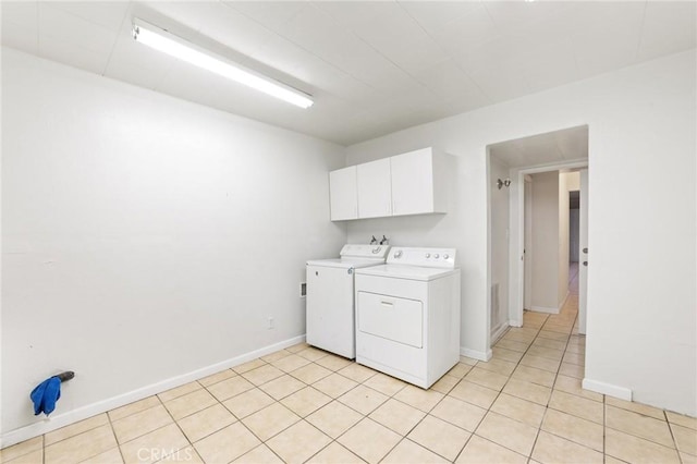 25286 N Rd, Twin Peaks, CA 92391 - laundry area featuring washing machine and dryer, cabinet space, and light tile patterned flooring