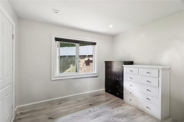 11911 Louise Ave, Granada Hills, CA 91344 - bedroom featuring light wood-style flooring and baseboards