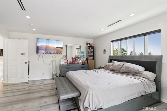 11911 Louise Ave, Granada Hills, CA 91344 - bedroom with light wood-style floors and recessed lighting