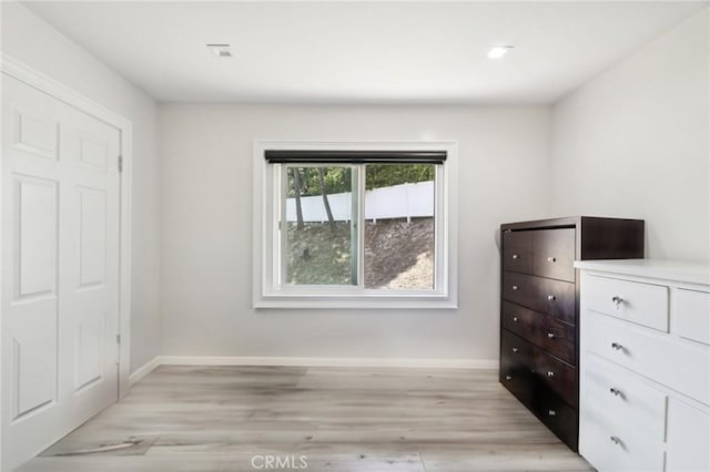11911 Louise Ave, Granada Hills, CA 91344 - unfurnished bedroom with light wood-type flooring