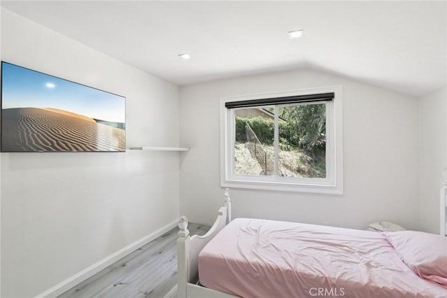 11911 Louise Ave, Granada Hills, CA 91344 - bedroom with wood finished floors and vaulted ceiling
