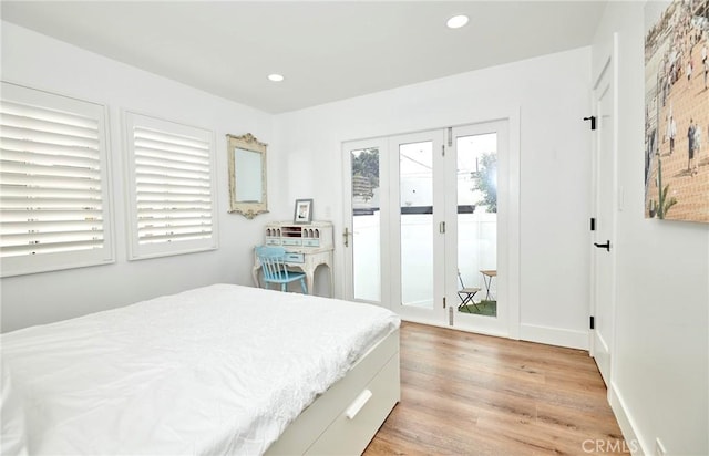 728 Euclid St, Santa Monica, CA 90402 - bedroom featuring access to outside, light wood-type flooring, and recessed lighting