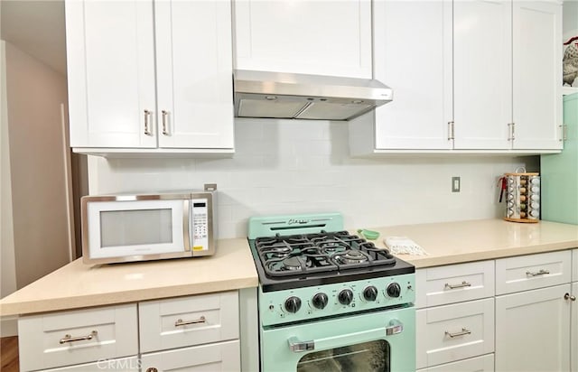 728 Euclid St, Santa Monica, CA 90402 - kitchen featuring gas range, ventilation hood, white cabinets, and light countertops