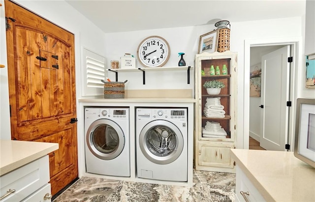 728 Euclid St, Santa Monica, CA 90402 - laundry room featuring separate washer and dryer and cabinet space