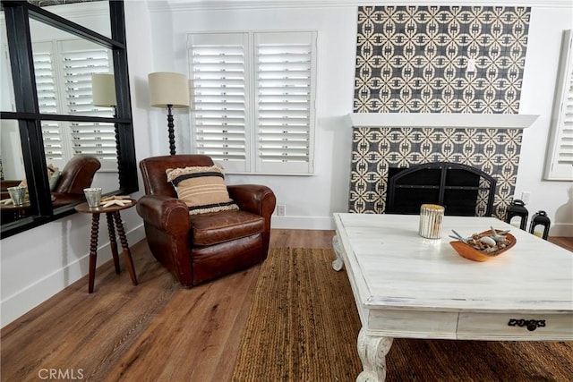 728 Euclid St, Santa Monica, CA 90402 - living area featuring wood finished floors, a fireplace, and healthy amount of natural light