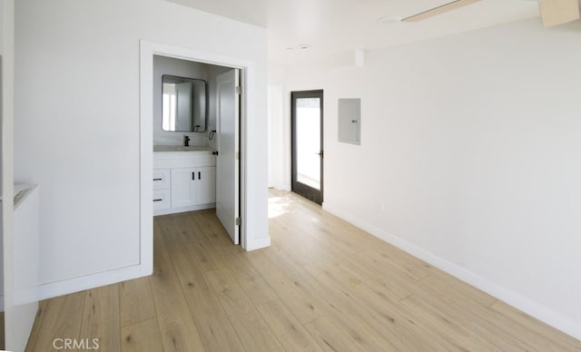 728 Euclid St, Santa Monica, CA 90402 - empty room with light wood-style flooring and electric panel