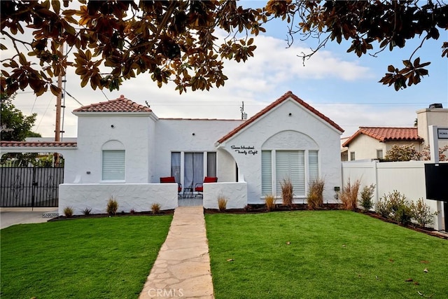 728 Euclid St, Santa Monica, CA 90402 - mediterranean / spanish home with a tile roof and stucco siding