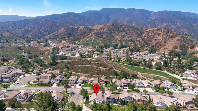 3401 Mountainside Cir, Corona, CA 92882 - aerial view of property and surrounding area with a mountainous background and nearby suburban area