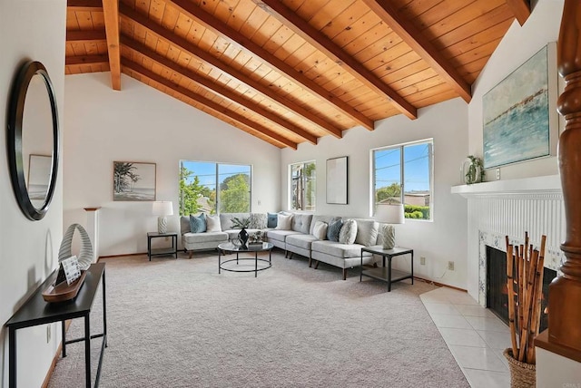 311 Corto, Solana Beach, CA 92075 - living room with a wood ceiling with exposed beams, light colored carpet, high vaulted ceiling, a tiled fireplace, and light tile patterned floors
