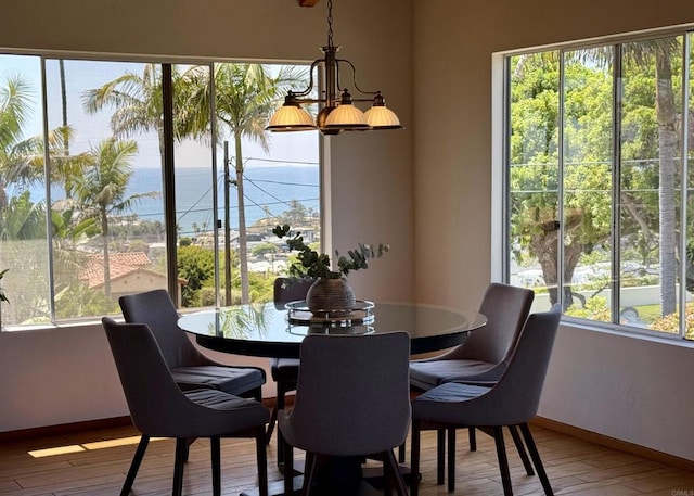 311 Corto, Solana Beach, CA 92075 - dining space featuring hardwood / wood-style flooring and a chandelier