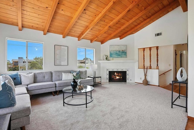311 Corto, Solana Beach, CA 92075 - living room with a wooden ceiling with exposed beams, high vaulted ceiling, a high end fireplace, and carpet