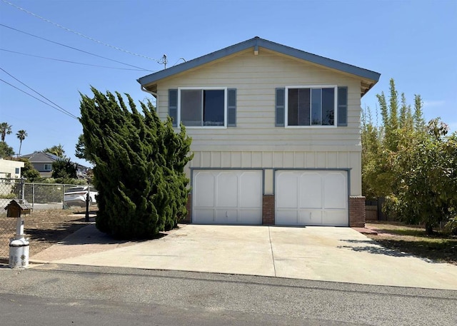 311 Corto, Solana Beach, CA 92075 - view of front of house featuring a garage and driveway