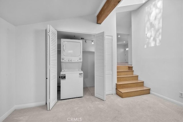 11 Dapplegray Ln, Rolling Hills Estates, CA 90274 - laundry area with stacked washer / dryer and light carpet