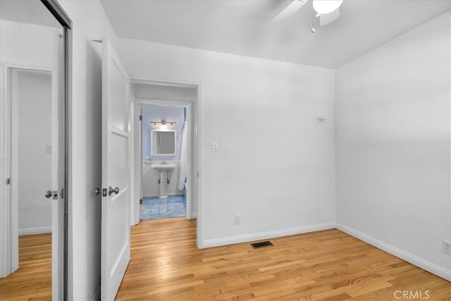 11 Dapplegray Ln, Rolling Hills Estates, CA 90274 - empty room with light wood finished floors and ceiling fan