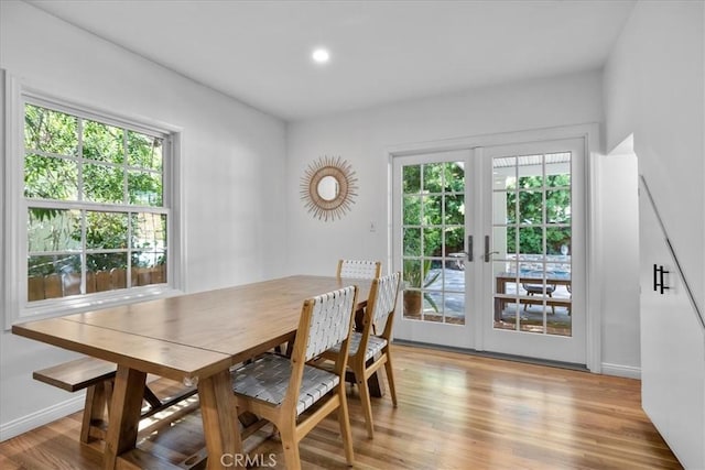 11 Dapplegray Ln, Rolling Hills Estates, CA 90274 - dining room with french doors, healthy amount of natural light, light wood-style floors, and recessed lighting