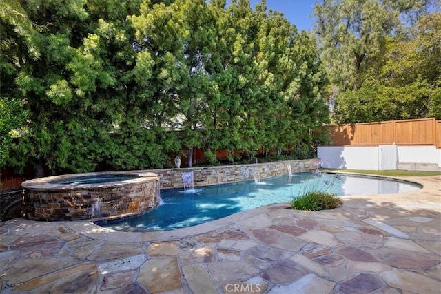 11 Dapplegray Ln, Rolling Hills Estates, CA 90274 - view of pool featuring a fenced backyard, a pool with connected hot tub, and a patio area