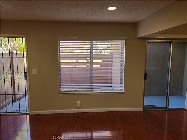 16806 Sierra Vista Way, Cerritos, CA 90703 - interior space with wood finished floors, a textured ceiling, a closet, and recessed lighting